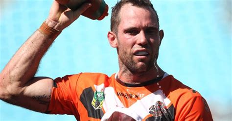 NRL: Laurie keen to stay with Tigers .